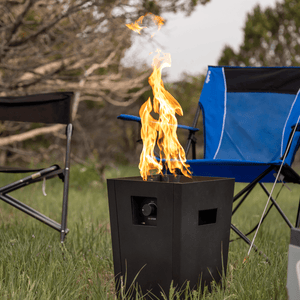 Live Outdoor Firestorm Series I Free Standing Fire Pit with Burner On at Campsite
