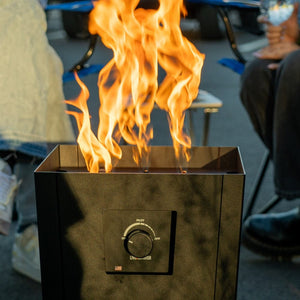 Live Outdoor Firestorm Series I Free Standing Fire Pit with the full burner on.