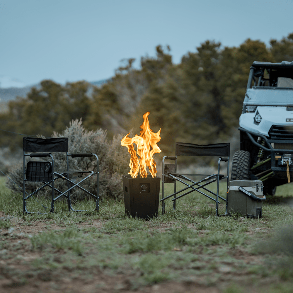 Using the Live Outdoor Firestorm Series I Free Standing Fire Pit at the campsite.