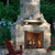 Majestic Castlewood Outdoor Wood-Burning Fireplace with brick finishing material