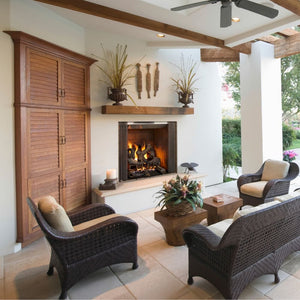 Majestic Castlewood Outdoor Wood-Burning Fireplace on a patio