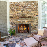 Majestic Cottagewood Wood-Burning Fireplace on a patio - side view