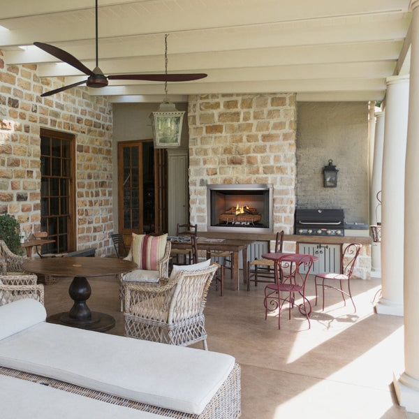 Majestic Vesper Vent-Free Outdoor Gas Fireplace under a pergola - lifestyle view