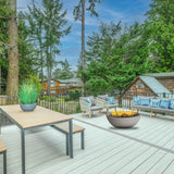 modern blaze off white gas fire bowl placed on a patio deck