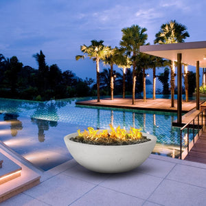modern blaze wok off white gas fire bowl in a contemporary pool area