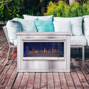 Montigo Mahana PL42VO Outdoor Fireplace with stainless steel enclosure on a wood deck