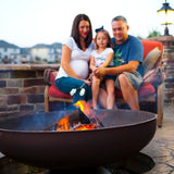 Family Roasting Marshmallows on Fire Pit