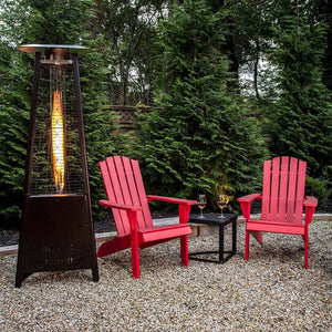 Paragon Outdoor Inferno Flame Tower Patio Heater beside two seats