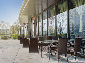 Paragon Outdoor Vesta Flame Tower Patio Heater in Bronze at a rooftop