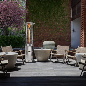 Paragon Outdoor Vulcan Round Propane Heater in Stainless Steel on the patio