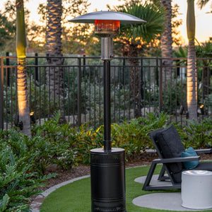 patio comfort jet silver propane patio heater in a garden