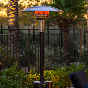 patio comfort jet silver propane patio heater in a lush outdoor space