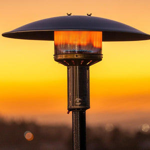 patio comfort jet silver propane heater on during the sunset