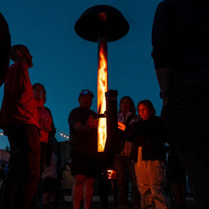 a crowd gathering around the patiofyre metro jetlamp pellet patio heater