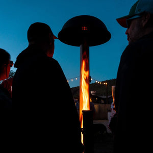 warming up by the patiofyre metro jetlamp pellet patio heater