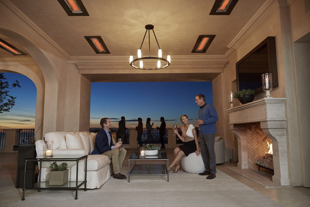 Covered terrace at dusk warmed by flush-mounted infrared patio heaters