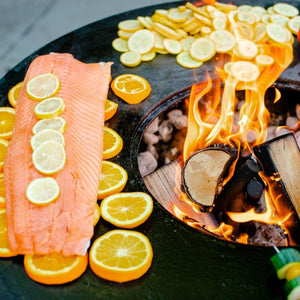 grilling a nice juicy salmon on the seasons fire pit grill