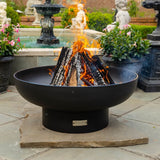 seasons fire pits elliptical steel fire pit on a paver - angle view