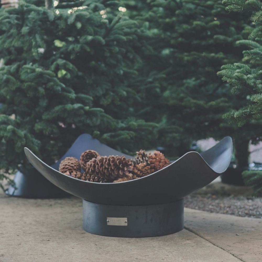 Seasons Fire Pits Quadrilateral Square Steel Fire Pit near christmas trees