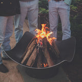 keeping warm around the Seasons Fire Pits Quadrilateral Square Steel Fire Pit