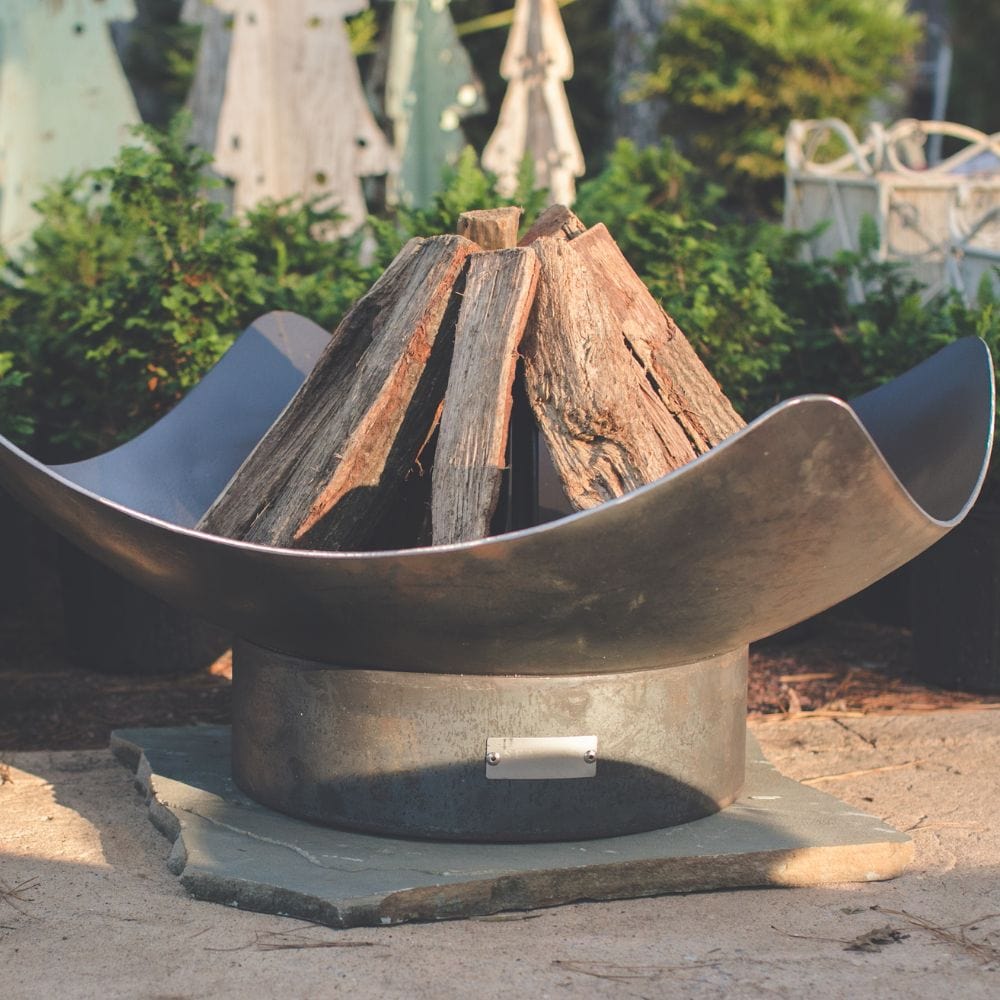 Seasons Fire Pits Quadrilateral Square Steel Fire Pit on a paver