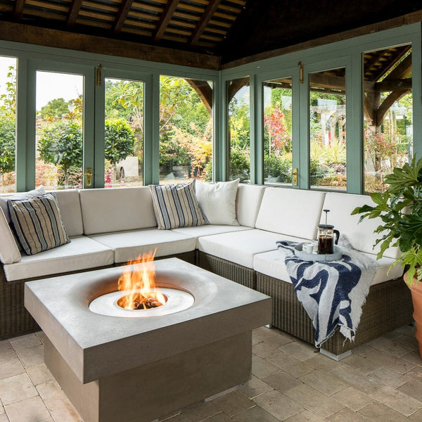 Solus Elevated Halo 36-Inch Square Gas Fire Pit in a cozy patio setting