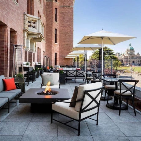 Solus Elevated Halo 48-Inch Square Gas Fire Pit at a cafe