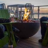 solus hemi fire pit on a wood deck - side view