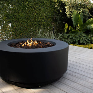 stonelum coliseo 1 round black fire pit with garden view