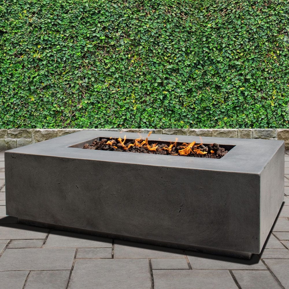 Stonelum Manhattan 01 Rectangular Graphite Fire Pit Table in a garden
