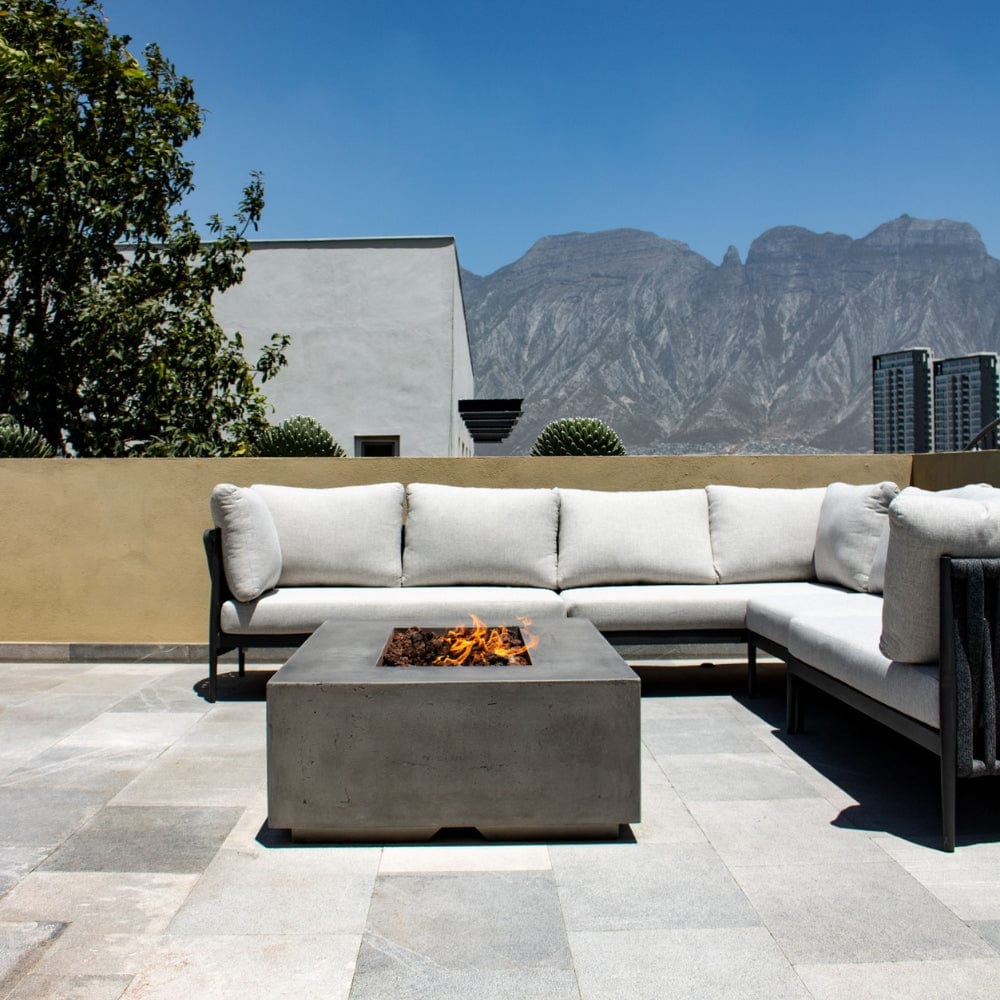 Stonelum Manhattan 01 Rectangular Graphite Fire Pit Table in a patio