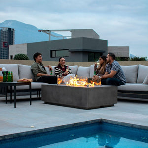 gathering around a gas fire pit