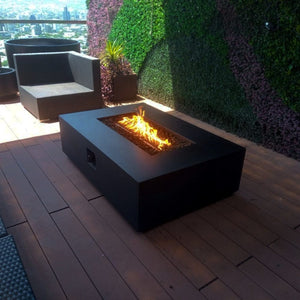 Stonelum Manhattan 01 Rectangular Black Fire Pit Table in a cozy outdoor space