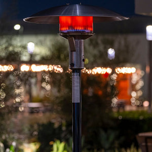 sunglo a242b black portable natural gas patio heater at night