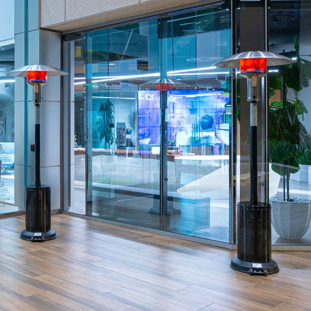 sunglo a242b portable propane patio heater at a building&#39;s entrance