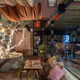 Sunpak S25 Wall/Ceiling Mounted Black Infrared Gas Heater at a cafe - side view