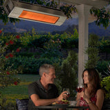 enjoying a glass of wine by the sunpak s25 stainless steel infrared gas patio heater