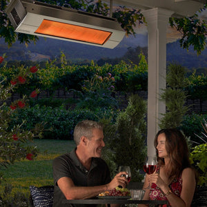 enjoying a glass of wine by the sunpak s25 stainless steel infrared gas patio heater