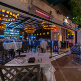 sunpak s34 infrared gas heaters on a restaurant's patio - lifestyle view