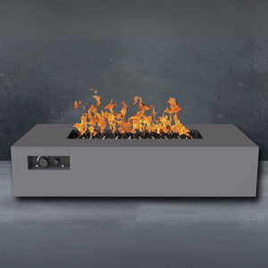 warming trends aon r72 rectangular fire pit table in charcoal with gray backdrop