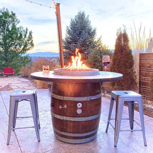 wine barrel dude full barrel gas fire pit table out in the yard at a backyard