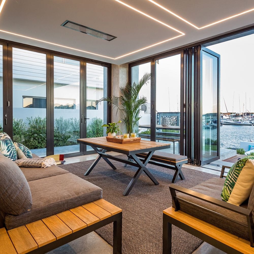 Bromic Platinum Smart-Heat Electric Patio Heater ceiling mounted by the coast