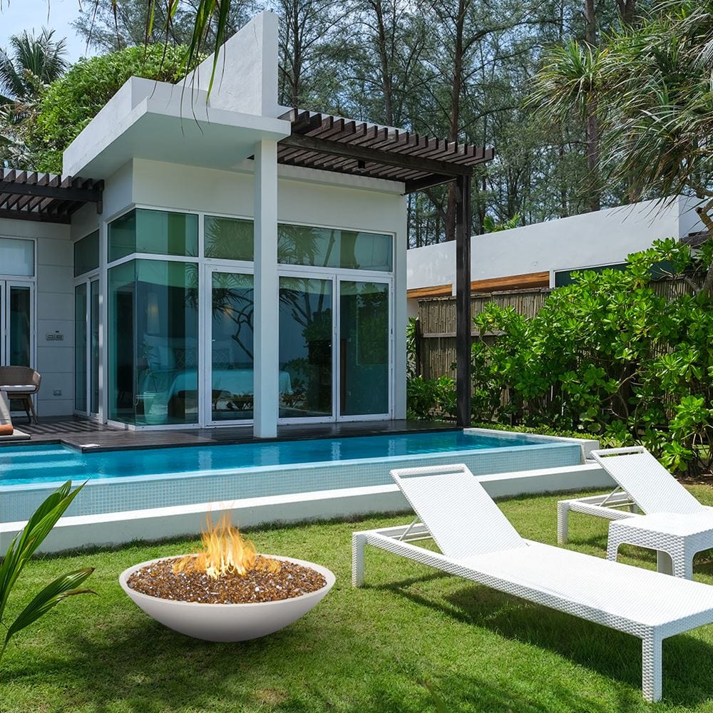 American Fyre Designs Marseille White Aspen Fire Bowl in the garden