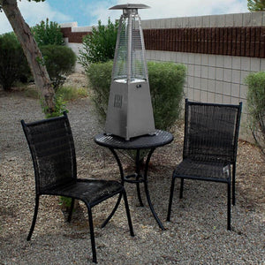 AZ Patio Heaters Hiland Stainless Steel Tabletop Heater with Flame on a Small Patio Table