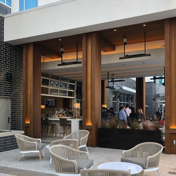 bromic tungsten electric patio heater mounted overhead at a restaurant and bar