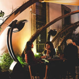 Bromic Tungsten Smart-Heat Portable Heaters Beside Table