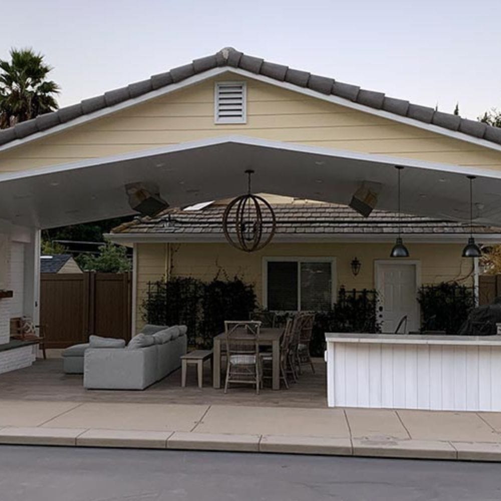 Calcana High Output Stainless Steel Gas Patio Heaters in a patio - angle view