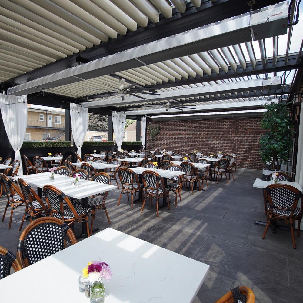 Calcana Standard Output 20&#39; Stainless Steel Gas Patio Heater in Outdoor Dining Area