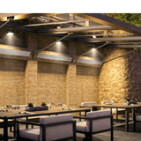 Dimplex DLW Series 1500W White Infrared Electric Heater mounted on stone wall