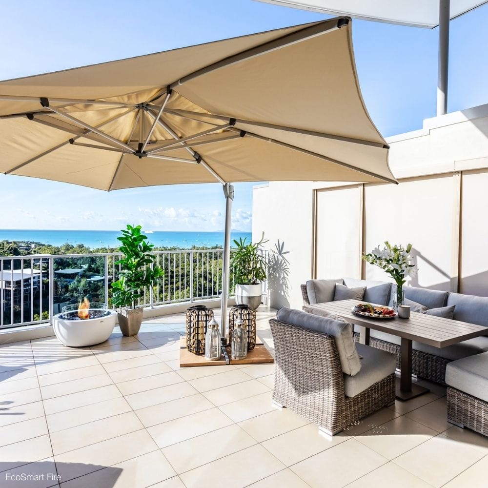 EcoSmart Fire Pod 30-Inch Round Concrete Fire Pit Bowl in Outdoor Dining Area